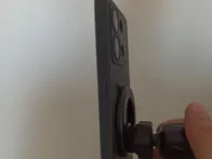 Mašininis telefono laikiklis